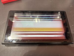Nintendo Switchの液晶が乱れて縦線が入った状態を戸田市で即日修理、データそのままの修理風景